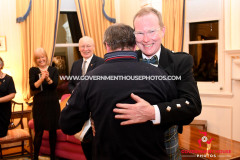 BEM investiture at Government House for Richard ‘Milky’ Quayle at Government House, Isle of Man - surprise guest John McGuinness