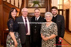 The Isle of Man Fire and Rescue Service annual medal presentation at Government House - Mark Walker (centre) with members of his family